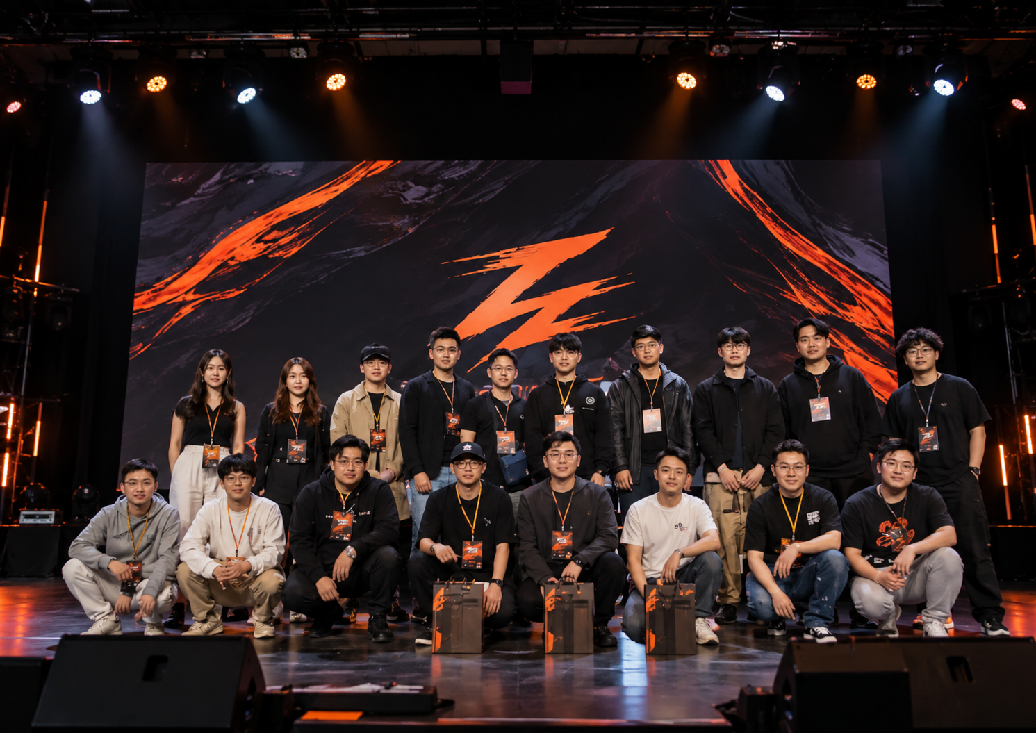 Group of event participants gathered on a stage